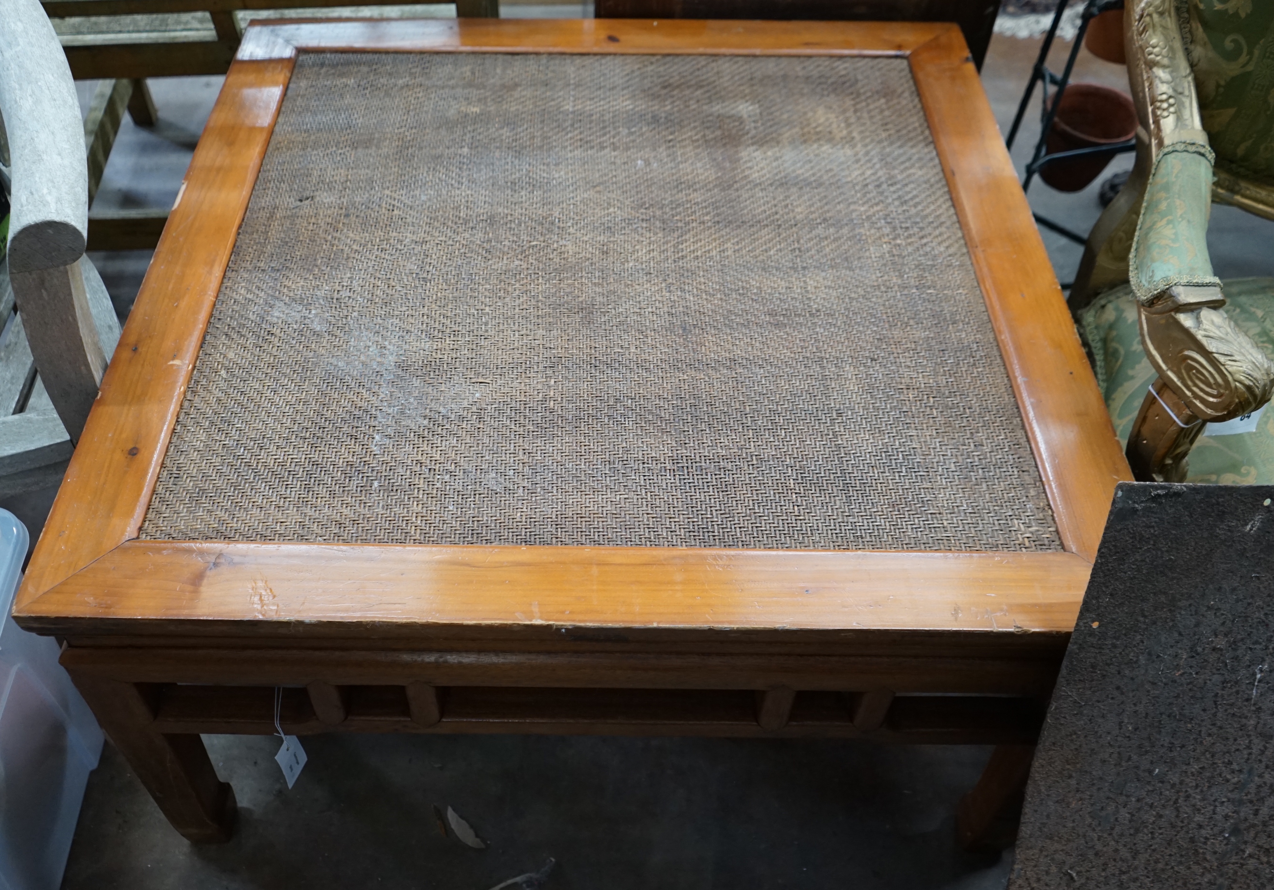 A Chinese caned pine and hardwood square low table, width 97cm height 51cm